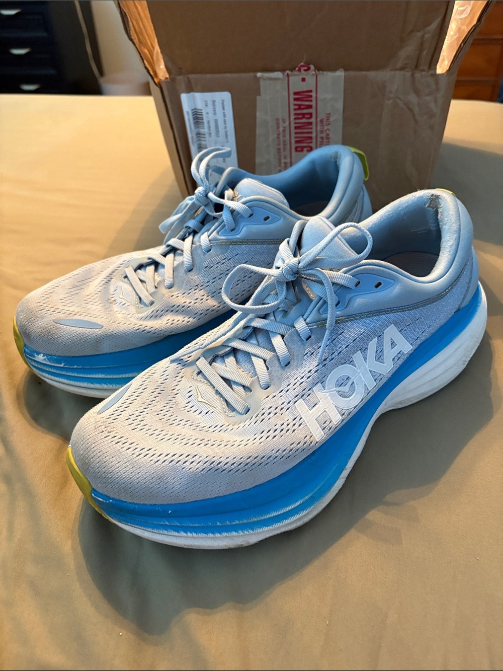 Hoka Bondi 8 Men’s Light Blue Running Shoes with Blue Midsole and Yellow Accents - Picture 2 of 5